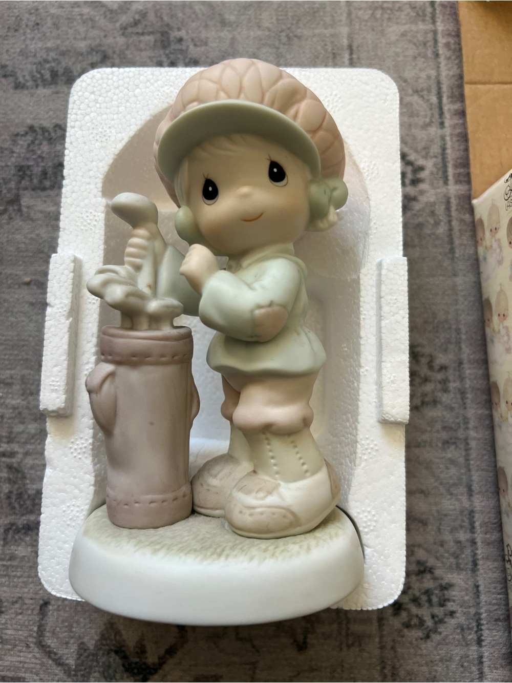 Precious moments golfer you suit me to a tee figurine.